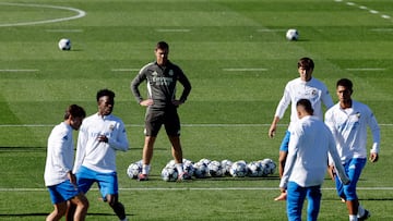 Real Madrid's Spanish coach Xabi Alonso watches his players during a training session on the eve of the UEFA Champions League football match between Liverpool and Real Madrid CF at the Real Madrid Sports City of Valdebebas in Madrid on November 3, 2025. (Photo by Oscar DEL POZO / AFP)