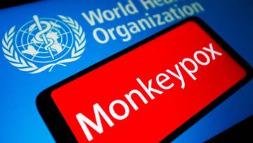 In this photo illustration, the word Monkeypox is seen on the screen of a smartphone with the World Health Organization (WHO) logo in the background.