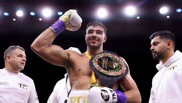 RIYADH, SAUDI ARABIA - FEBRUARY 26: Jake Paul pose for a photo with their Title Belt and coaching team after defeating Jake Paul during the Cruiserweight Title fight between Jake Paul and Tommy Fury at the Diriyah Arena on February 26, 2023 in Riyadh, Saudi Arabia. (Photo by Francois Nel/Getty Images)