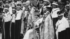 2nd June 1953:  Queen Elizabeth II seated upon the throne at her coronation in Westminster Abbey, London.  She is holding the royal sceptre (ensign of kingly power and justice) and the rod with the dove (symbolising equity and mercy).  (Photo by Topical Press Agency/Getty Images)