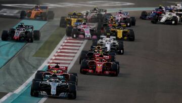 ABU DHABI, UNITED ARAB EMIRATES - NOVEMBER 25: Valtteri Bottas driving the (77) Mercedes AMG Petronas F1 Team Mercedes WO9 leads Sebastian Vettel of Germany driving the (5) Scuderia Ferrari SF71H on track during the Abu Dhabi Formula One Grand Prix at Yas Marina Circuit on November 25, 2018 in Abu Dhabi, United Arab Emirates. (Photo by Charles Coates/Getty Images)
