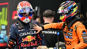 McLaren's Australian driver Oscar Piastri (R) congratulates Red Bull Racing's Dutch driver Max Verstappen (L) after the qualifying round for the 2025 Saudi Arabia Formula One Grand Prix at the Jeddah Corniche Circuit on April 19, 2025. (Photo by Giuseppe CACACE / AFP)