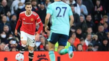 Manchester United&#039;s Portuguese defender Diogo Dalot controls the ball during the English Premier League football match between Manchester United and Leicester City at Old Trafford in Manchester, north west England, on April 2, 2022. (Photo by Lindsey