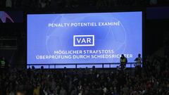 Soccer Football - Champions League - Group A - Paris St Germain v RB Leipzig - Parc des Princes, Paris, France - October 19, 2021 General view of the scoreboard as it displays a VAR review to award a penalty to Paris Saint Germain REUTERS/Benoit Tessier