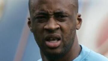 Abidal con Eto´o en pleno entrenamiento