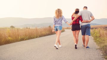 'Love triangle' concept. One man with two woman. RELACION POLIAMOROSA