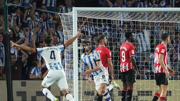 Real Sociedad's French defender #24 Robin Le Normand celebrates after scoring his team's first goal during the Spanish Liga football match between Real Sociedad and Athletic Club Bilbao at the Anoeta stadium in San Sebastian on September 30, 2023. (Photo by CESAR MANSO / AFP)