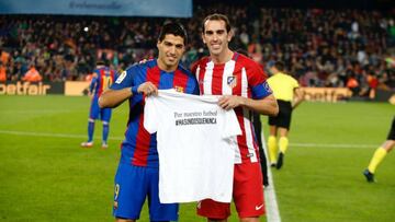 Godín y Suárez mostraron su apoyo al fútbol uruguayo