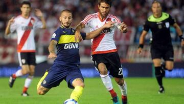 Darío Benedettto y Leo Ponzio durante un Boca Juniors-River Plate.