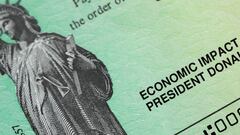 Cheque de est&iacute;mulo con el nombre del Presidente Donald Trump.