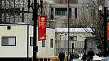 SALT LAKE YA ESTÁ LISTA. Una foto gigantesca de una patinadora, en las cercanías del gran templo de los mormones, ilustra el ambiente preolímpico de Salt Lake City. Los juegos comenzarán el próximo 8 de febrero.