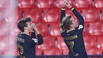 Griezmann celebra uno de sus goles en Granada.