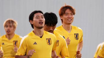 DOHA, QATAR - NOVEMBER 22: Kou Itakura of Japan looks on during the Japan Training Session at Al Sadd New Training Facilities on November 22, 2022 in Doha, Qatar. (Photo by Christopher Lee/Getty Images )