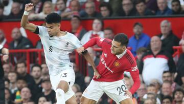 MANCHESTER, ENGLAND - AUGUST 22: Diogo Dalot of Manchester United in action with Luis Díaz of Liverpool during the Premier League match between Manchester United and Liverpool FC at Old Trafford on August 22, 2022 in Manchester, England. (Photo by Tom Purslow/Manchester United via Getty Images)