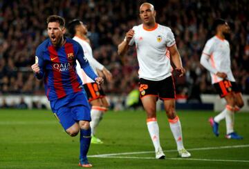 Barcelona's Lionel Messi celebrates his second goal against Valencia.