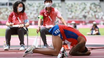 Tokyo 2020 Olympics - Athletics - Men's Long Jump - Final - Olympic Stadium, Tokyo, Japan - August 2, 2021. Juan Miguel Echevarria of Cuba looks dejected after sustaining an injury during his final jump REUTERS/Kai Pfaffenbach