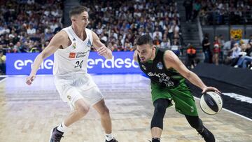 Jaycee Carroll of Real Madrid and Albert Ventura of Divina Seguros Joventut during King&#039;s Cup Semi Finals match between Real Madrid and Divina Seguros Joventut at Wizink Center in Madrid, Spain. February 16, 2019.