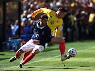 Colombia's midfielder #10 James Rodriguez and France's defender #21 Lucas Hernandez fight for the ball during a friendly football match between Colombia and France at Northwest Stadium in Landover, Maryland, on March 29, 2026. (Photo by FRANCK FIFE / AFP)