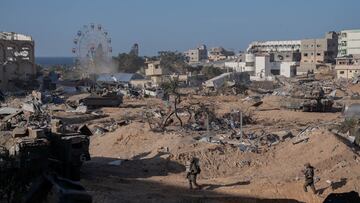 Israeli soldiers walk during an operation, amid the ongoing conflict between Israel and Hamas, as they continue their ground offensive in Gaza on November 7, 2023.    Israel Defense Forces/Handout via REUTERS    THIS IMAGE HAS BEEN SUPPLIED BY A THIRD PARTY. MANDATORY CREDIT