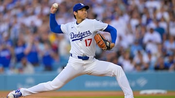 Jun 16, 2025; Los Angeles, California, USA; Los Angeles Dodgers designated hitter Shohei Ohtani (17) throws against the San Diego Padres during the first inning at Dodger Stadium. Mandatory Credit: Jayne Kamin-Oncea-Imagn Images