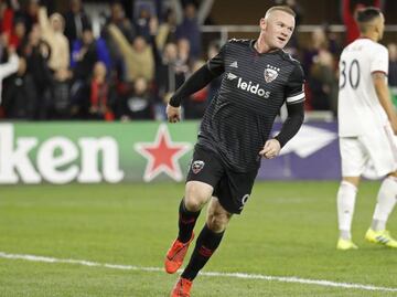 United forward Wayne Rooney (9) celebrates after scoring a goal against Real Salt Lake in the first half at Audi Field.