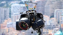 MONTE-CARLO, MONACO - MAY 26: The car of Sergio Perez of Mexico and Oracle Red Bull Racing is recovered from the track after crashing during the F1 Grand Prix of Monaco at Circuit de Monaco on May 26, 2024 in Monte-Carlo, Monaco. (Photo by Clive Rose/Getty Images)