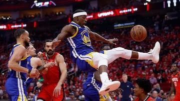 Jimmy Butler III #10 of the Golden State Warriors is fouled by Amen Thompson #1 of the Houston Rockets in the first half in Game Two of the Western Conference First Round NBA Playoffs at Toyota Center on April 23, 2025 in Houston, Texas.