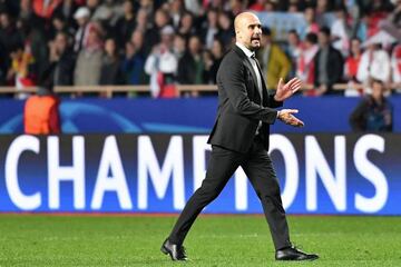 Manchester City's Spanish manager Pep Guardiola reacts after Monaco defeat.