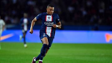 PARIS, FRANCE - OCTOBER 16: Kylian Mba of Paris Saint-Germain runs with the ball during the Ligue 1 match between Paris Saint-Germain and Olympique Marseille at Parc des Princes on October 16, 2022 in Paris, France. (Photo by Aurelien Meunier - PSG/PSG via Getty Images)
