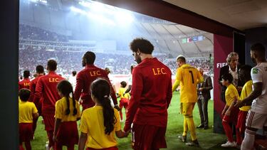 Players of Liverpool and CR Flamengo walk out to the pitch ahead of the FIFA Club World Cup Qatar 2019 Final match between Liverpool FC and CR Flamengo at Khalifa International Stadium
