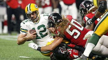 Sep 17, 2017; Atlanta, GA, USA; Green Bay Packers quarterback Aaron Rodgers (12) is sacked by Atlanta Falcons outside linebacker De'Vondre Campbell (59) and defensive end Brooks Reed (50) in the second quarter at Mercedes-Benz Stadium. Mandatory Credit: Brett Davis-USA TODAY Sports