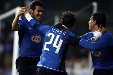 Luis García celebra un gol junto a Simao y el Kun Agüero.