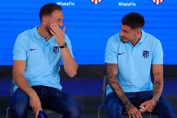 Jan Oblak y José María Giménez.