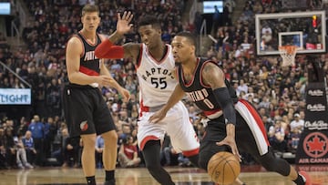 Feb 26, 2017; Toronto, Ontario, CAN; Portland Trail Blazers guard Damian Lillard (0) moves to the basket as Toronto Raptors guard Delon Wright (55) tries to defend during the third quarter in a game at Air Canada Centre. The Toronto Raptors won 112-106. Mandatory Credit: Nick Turchiaro-USA TODAY Sports