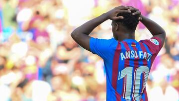 Barcelona's Spanish midfielder Ansu Fati reacts during the Spanish League football match between FC Barcelona and Real Madrid CF at the Camp Nou stadium in Barcelona on October 24, 2021. (Photo by LLUIS GENE / AFP)