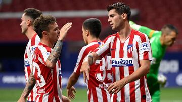 Atletico Madrid's Spanish forward Alvaro Morata (R) celebrates with teammates after scoring a second goal during the Spanish League football match between Atletico Madrid and Mallorca at the Wanda Metropolitan stadium in Madrid on July 3, 2020. (Phot