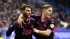 (LtoR) Santiago Gimenez and Marcus Pedersen of Feyenoord celebrate after their ream's 2nd goal during the Dutch Eredivisie football match between Heerenveen and Feyenoord at Abe Lenstra Stadium in Heerenveen, Netherlands, on February 12, 2023. (Photo by Olaf Kraak / ANP / AFP) / Netherlands OUT