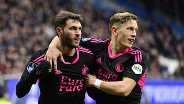 (LtoR) Santiago Gimenez and Marcus Pedersen of Feyenoord celebrate after their ream's 2nd goal during the Dutch Eredivisie football match between Heerenveen and Feyenoord at Abe Lenstra Stadium in Heerenveen, Netherlands, on February 12, 2023. (Photo by Olaf Kraak / ANP / AFP) / Netherlands OUT