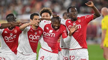 Monaco's players celebrate with Malian midfielder #04 Mohamed Camara (2R) after he scored Monaco's third goal during the French L1 football match between AS Monaco and FC Nantes at the Louis II Stadium (Stade Louis II) in the Principality of Monaco on May 19, 2024. (Photo by Nicolas TUCAT / AFP)