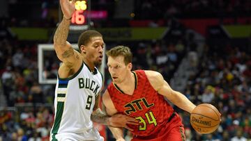 Mike Dunleavy ante la defensa de Michael Beasley