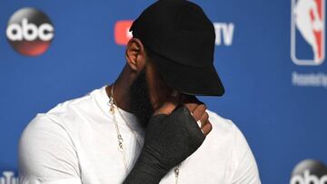 CLEVELAND, OH - JUNE 08: LeBron James #23 of the Cleveland Cavaliers speaks to the media with a cast on his right hand after being defeated by the Golden State Warriors during Game Four of the 2018 NBA Finals at Quicken Loans Arena on June 8, 2018 in Clev