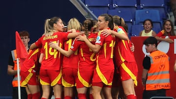 Spain's forward #20 Claudia Pina celebrates with teammates scoring her team's first goal during the UEFA Women's Nations League Group A3 football match between Spain and England at�the RCDE Stadium in Cornella de Llobregat, outside Barcelona, on June 3, 2025. (Photo by LLUIS GENE / AFP)