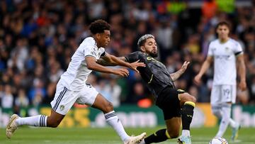 LEEDS, ENGLAND - OCTOBER 02: Douglas Luiz of Aston Villa is tackled by Tyler Adams of Leeds United during the Premier League match between Leeds United and Aston Villa at Elland Road on October 02, 2022 in Leeds, England. (Photo by Stu Forster/Getty Images)