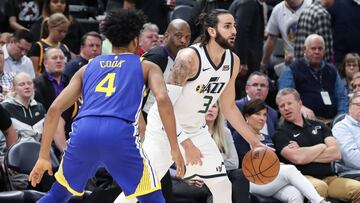 Apr 10, 2018; Salt Lake City, UT, USA; Utah Jazz guard Ricky Rubio (3) looks to pass the ball defended by Golden State Warriors guard Quinn Cook (4) during the second half at Vivint Smart Home Arena. Utah Jazz won 119-79. Mandatory Credit: Chris Nicoll-US