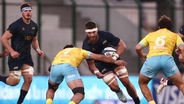 Rugby Union - Uruguay v Argentina - Estadio Domingo Burgueno, Maldonado, Uruguay - July 20, 2024 Argentina's Marcos Kremer in action with Uruguay's Santiago Civetta REUTERS/Mariana Greif