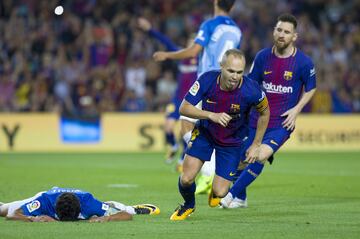 Iniesta makes it 2-0 after a good pass by Messi.