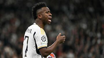 Real Madrid's Brazilian forward #07 Vinicius Junior reacts during the UEFA Champions League last 16 second leg football match between Real Madrid CF and RB Leipzig at the Santiago Bernabeu stadium in Madrid on March 6, 2024. (Photo by JAVIER SORIANO / AFP)