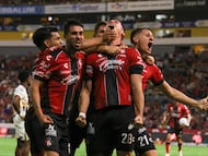 Atlas' Argentine defender #28 Manuel Capasso celebrates scoring his team's second goal during the Liga MX Clausura tournament football match between Atlas and Pumas at Jalisco Stadium in Guadalajara, Mexico, on February 7, 2026. (Photo by Roberto ANTILLON / AFP)