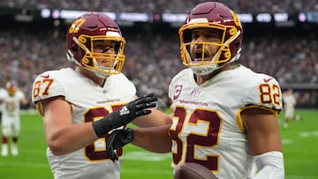 Washington Football Team tight end Logan Thomas (82) celebrates with John Bates (87) after scoring a touchdown against the Las Vegas Raiders.