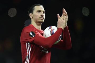 Ibrahimovic applauds the home fans with the match ball.